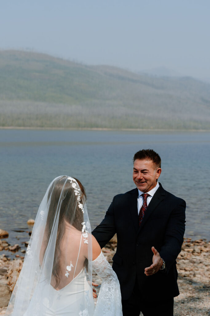 Joyful first look between bride and her father