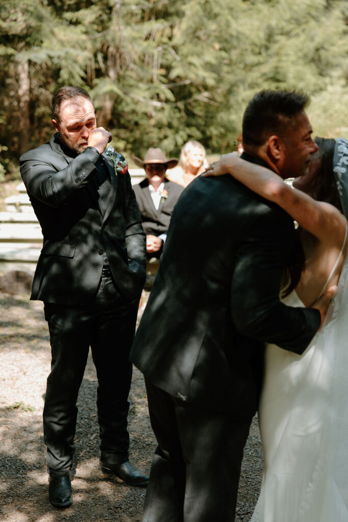 Groom gets emotional while his bride meets him at the alter