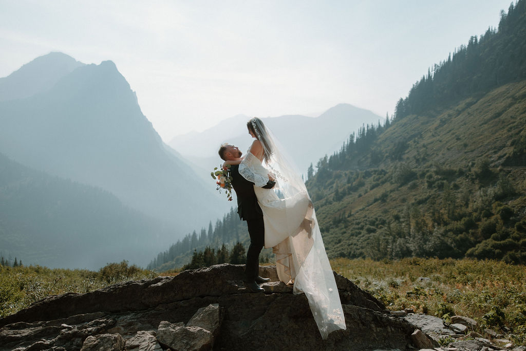 Newlywed bridal portraits at Logan Pass, photographed by Wild Summit Photo