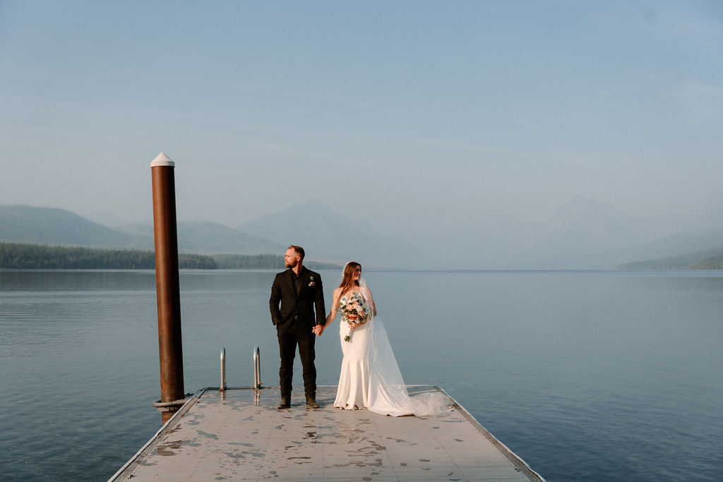 Adventurous newlywed bridal portraits at Lake McDonald in Glacier National Park 
